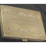 A possibly Russian silver cigarette case, floral and engine turned Art Deco exterior,