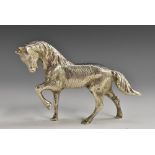 A French cast silver model, of a horse, 12cm wide,