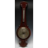 A Victorian mahogany wheel barometer, 24cm silvered register, alcohol thermometer,