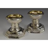 A pair of Victorian silver canted square table salts, of William and Mary design,