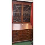 A George III mahogany bureau bookcase,