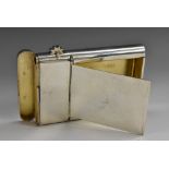 A Victorian silver combination vesta, cigarette case and cigar lighter, hinged covers,