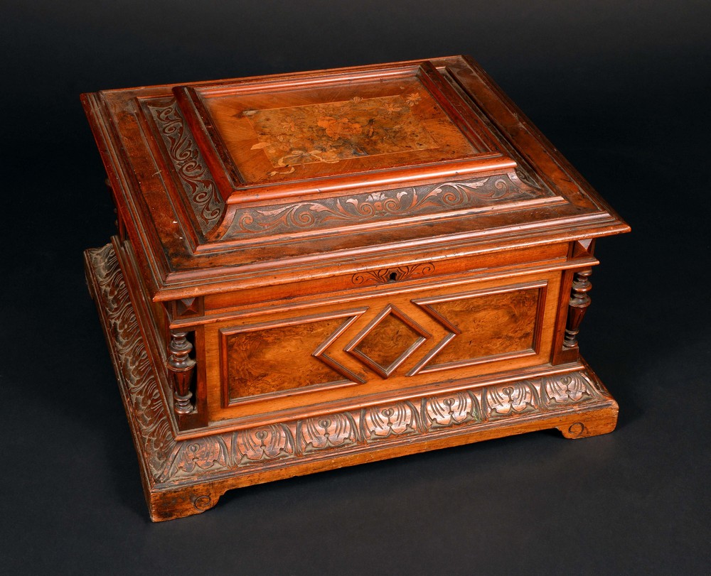 A 19th century walnut and marquetry table-top polyphon, the horizontal mechanism playing 40cm discs,