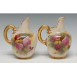 A pair of Royal Worcester flat sided jugs,