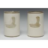 A pair of Wedgwood creamware cylindrical mugs, transfer printed with cornucopia horns, line borders,