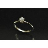 Tiffany & Co - a diamond solitaire ring, round modern brilliant cut, approx 0.