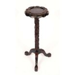 A 19th century Chinese padouk wood tripod kettle stand, of English George II design,