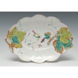 A Chelsea leaf and basket weave moulded twig handled dish, painted with moths, in relief with vine,