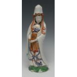 A Japanese porcelain figure, of Kannon or Guanyin, she stands, holding a scroll,