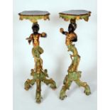 A pair of 19th century Venetian polychrome and parcel gilt Blackamoor torcheres,