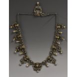 A 19th century Bacchanalian mask head necklace,