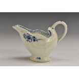 A Lowestoft Daisy pattern dolphin ewer, painted in underglaze blue with floral sprays,