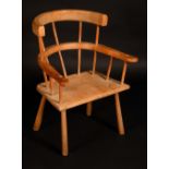 A 19th century elm and ash famine type primitive Windsor chair, possibly Irish,