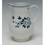 A Liverpool baluster jug, painted with flowers in underglaze blue, 12cm high, c.