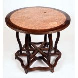 A Chinese hardwood centre table, reeded circular top with inset soapstone panel, folding base,