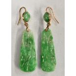 A pair of carved jade and diamond panel drop earrings,