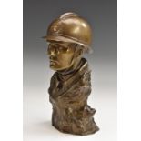 Henri-Joseph Holemans (Belgian 1894 - 1973), a brown patinated bronze, of a World War I soldier,