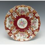 A Worcester large deep shaped dish, possibly outside decorated with fan shaped reserves and vases,