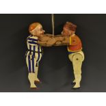 A 19th century polychrome softwood and gesso articulated caricature toy,