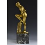 Max Klinger (1857 - 1920), a gilt patinated bronze, The Bather, she stands nude,