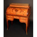 A 19th century gilt metal mounted rosewood and marquetry bureau a cylindre,