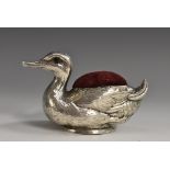 An Edwardian silver novelty pin cushion, as a duck, 7.