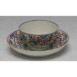 A Worcester teabowl and saucer,