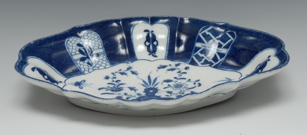 A Caughley Scholar's Rock pattern lozenge shaped dish, painted with rock and foliage,