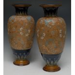 A large pair of Royal Doulton ovoid pedestal vases,