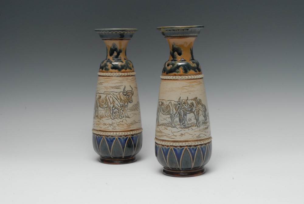 A pair of Doulton Lambeth baluster vases, by Hannah Barlow, monogrammed,