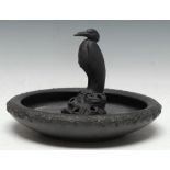 A Wedgwood basalt egret heron centrepiece, the bowl in relief with fruiting vine, 30cm diam,