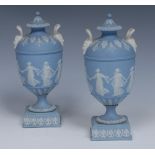A good pair of Wedgwood Jasperware pedestal ovoid vases and covers,