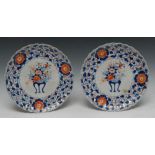 A pair of Japanese Imari fluted circular dishes,