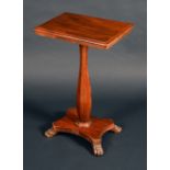 A 19th century rosewood and mahogany pedestal occasional table, rounded rectangular top,