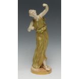 A Royal Worcester figure, of a dancing maiden, modelled by James Hadley, she stands,