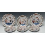 A graduating set of six Japanese Imari fluted circular dishes, comprising two large,