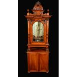 A 19th century walnut coin operated penny-in-the-slot floor standing polyphon,
