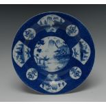 A Bow circular plate, painted with central landscape,