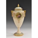 A Royal Worcester two-handled ovoid pedestal vase and cover,