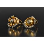 A pair of diamond earrings,