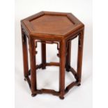 A Chinese hardwood hexagonal jardiniere stand,