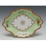 A Flight Barr and Barr Worcester shaped oval dish, the apple green rim with four flower sprays,