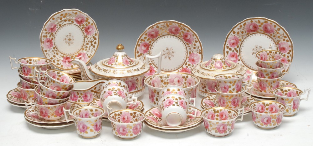 An early 19th century English porcelain tea service, comprising fluted circular teapot,