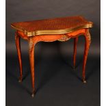 A 19th century gilt metal mounted kingwood and parquetry shaped serpentine card table,