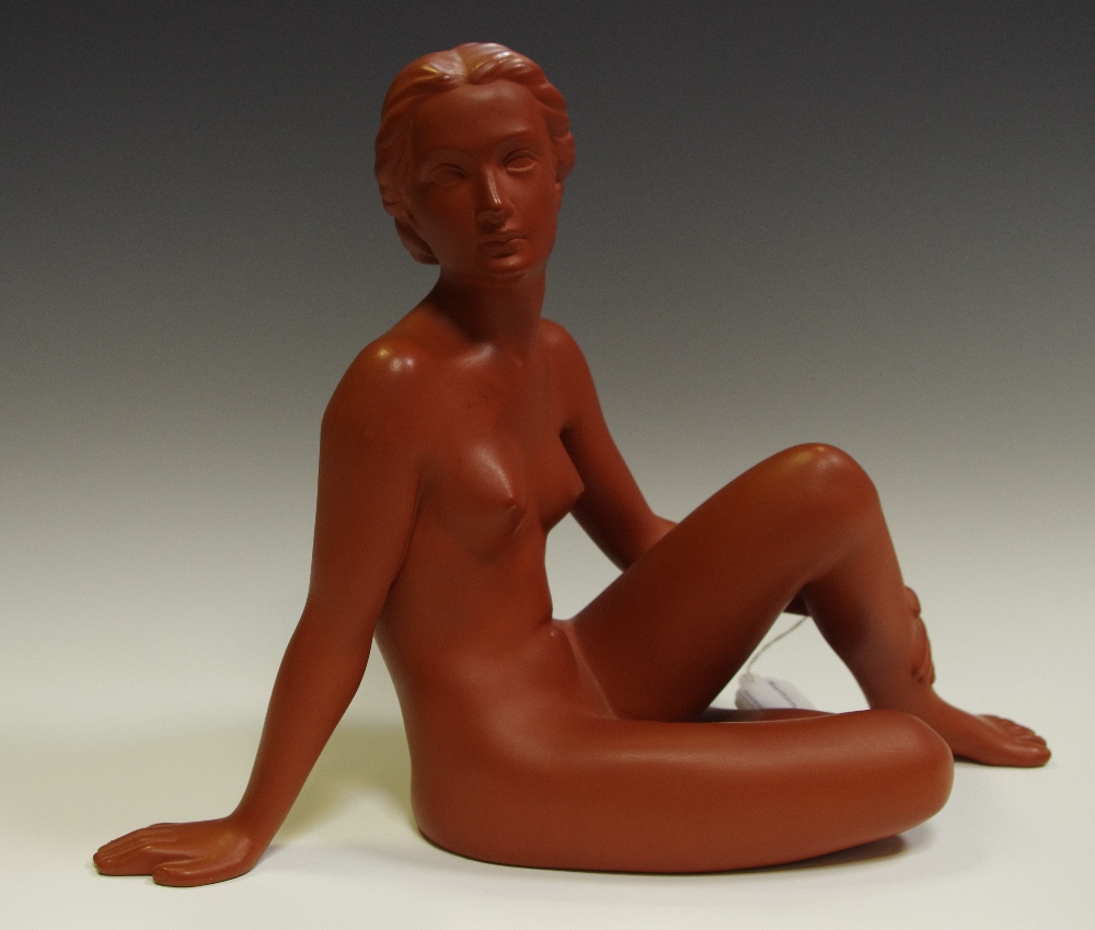 A 20th century model, of a nude, seated, terracotta glaze, 25cm high, model no.