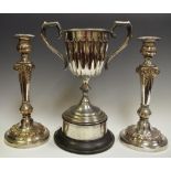 A pair of silver plated on copper 19th century candlesticks;