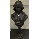 An 18th century style plaster bust of a lady on conforming plinth