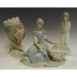 A Lladro figure of a lady with wash bowl;