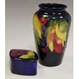 A Moorcroft miniature vase;