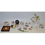 Decorative Ceramics - a Radnor floral encrusted boudoir candlesticks;